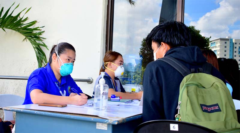 All patients entering TMC Iloilo are required to pass through the Pre-Screening Area where assessment for signs and symptoms, travel history taking, and initial temperature checking is being done.