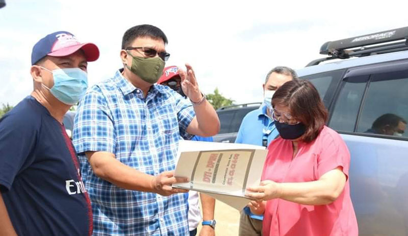 Passi City officials Mayor Stephen Palmares and Vice Mayor Jesry Palmares together with NEDA Director Ro-ann Bacal checking the infrastructure projects in Passi City.