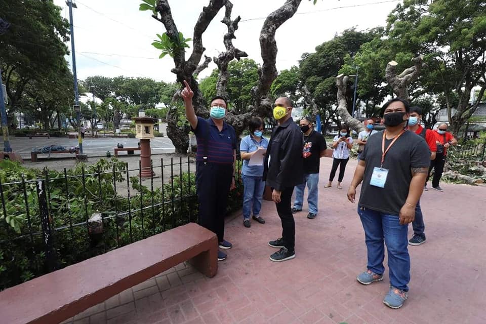 Mayor Jerry P. Trenas checks the trimming of trees at Plaza Libertad with Iloilo City Engineer Salvador Pedregosa, and Architect Reggie Gregorio.