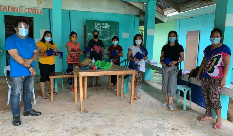 LGU employees of Barangay Loong in Concepcion, Iloilo get face masks.