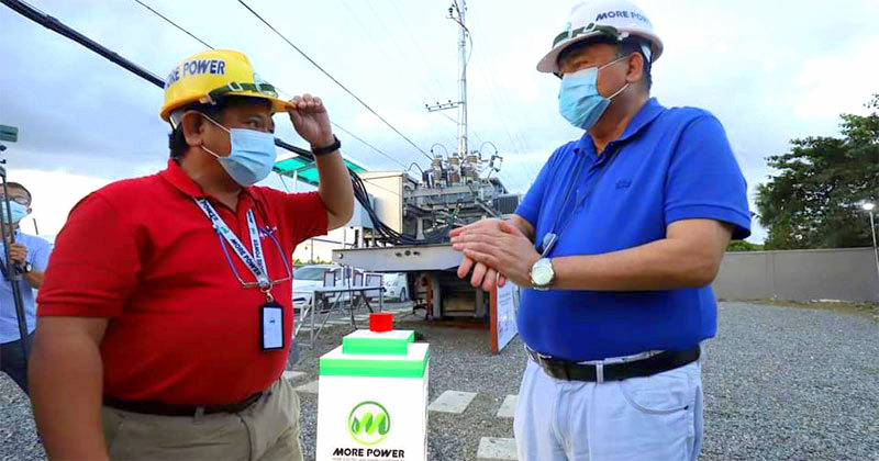 MORE Power president Roel Z. Castro with Iloilo City Mayor Jerry P. Trenas.