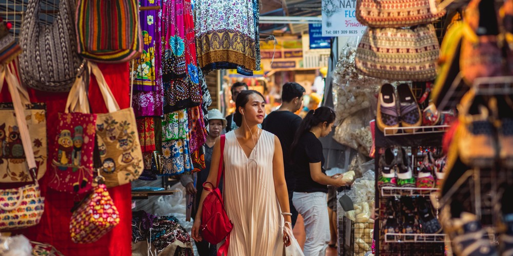 Chatuchak Market is a popular shopping destination in Bangkok Thailand with more than 15,000 stalls of a great variety of products including trendy clothes and fashion-forward accessories as well as hand-made crafts souvenirs at bargain prices.