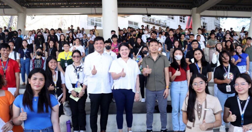 Uswag Scholarship payout at Plaza Libertad with Councilor Miguel Treñas, Executive Assistant Raisa Treñas-Chu and Program head Rene Jabican.